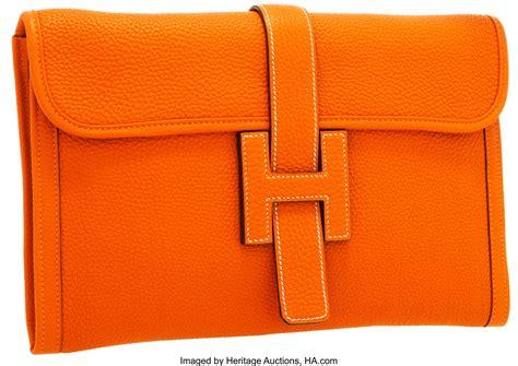 hermes orange clutch|hermes jige clutch price.